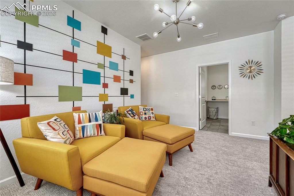 Across from the loft is the laundry room with electric hookups
