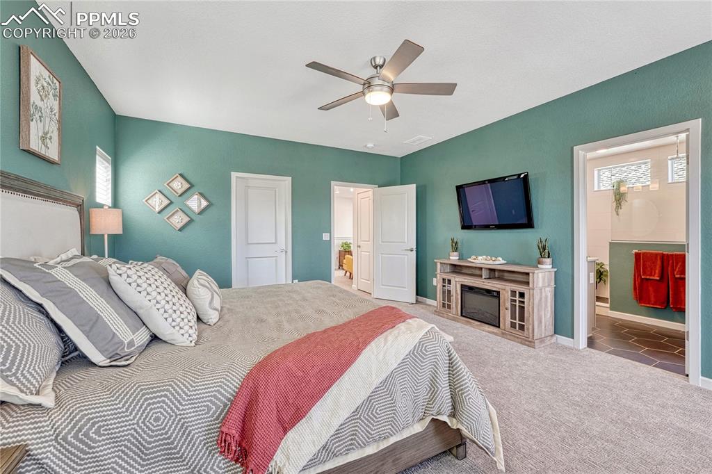 The upper level has beautiful, brand-new textured carpet and the same high ceilings
