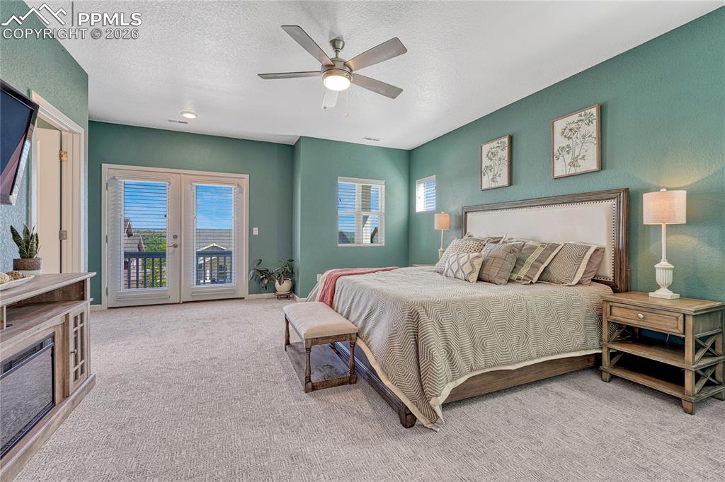 The master bedroom has its very own walk out access to a front porch/balcony with mountain views
