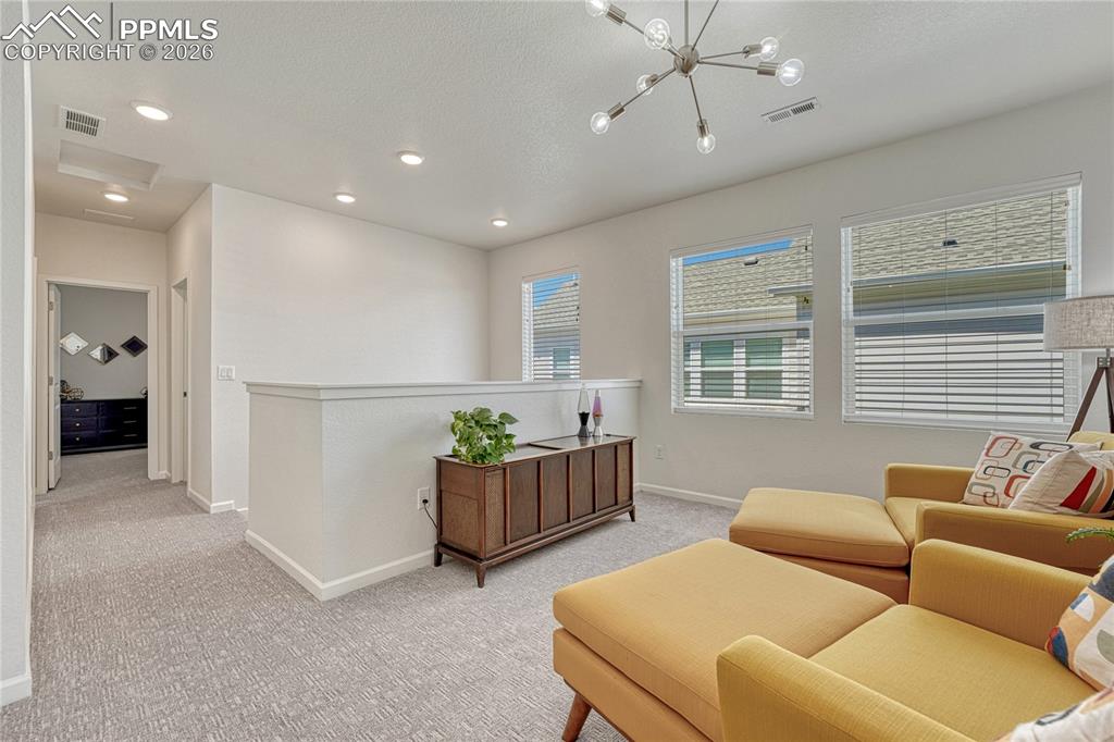 The loft helps separate the upper rooms for privacy but adds an opportunity for another living space
