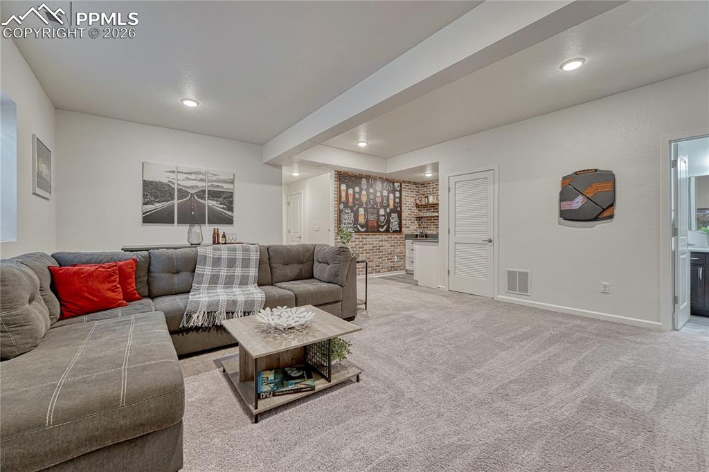 A great space to relax or entertain with the built-in wet bar, bedrooms and bathroom
