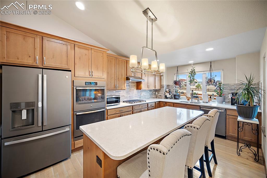 Matte finished SS appliances.