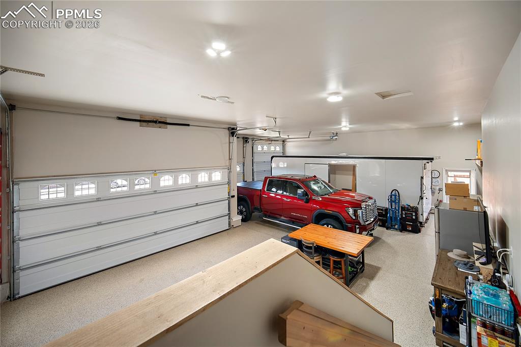 Finished garage with RV parking. A car lovers dream!