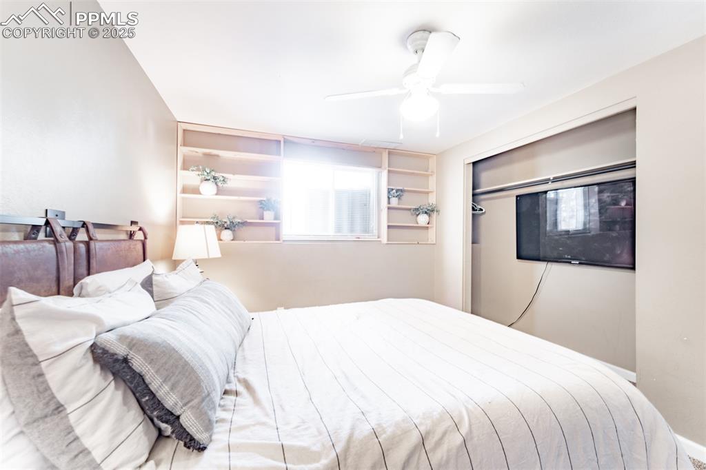 Bedroom featuring ceiling fan