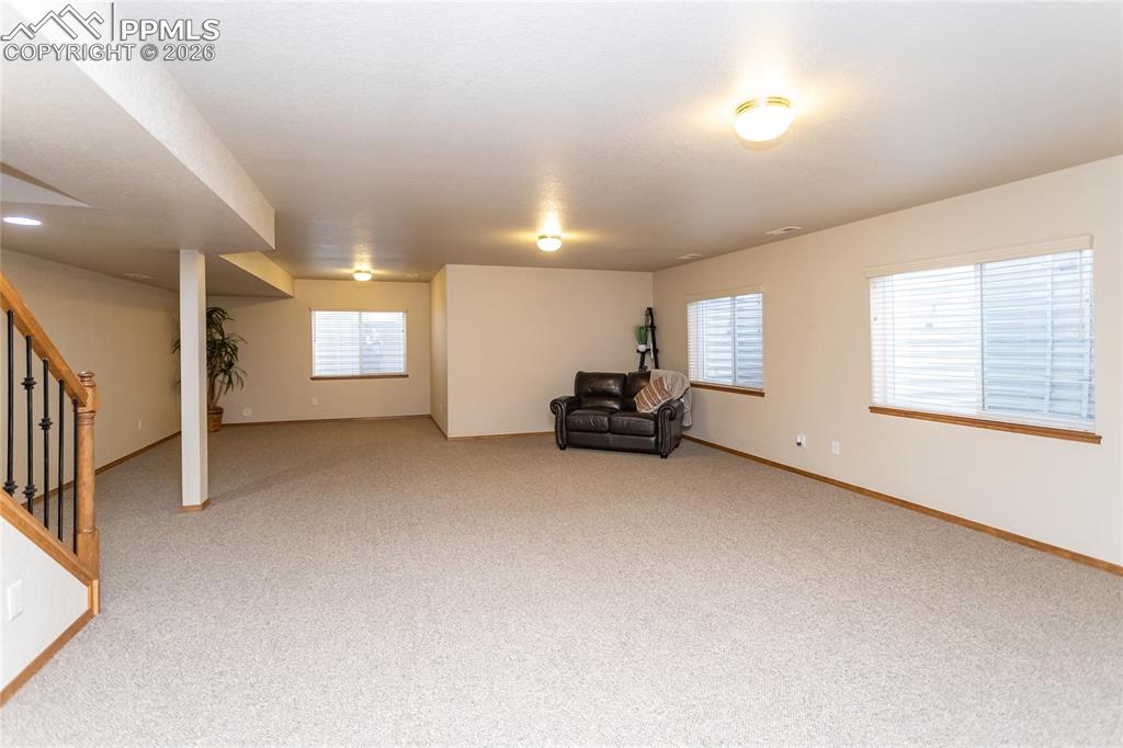 There is plenty of room for a pool table or a future bar area!