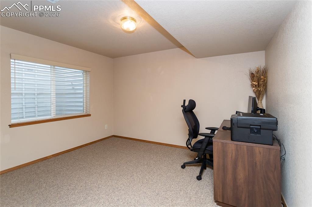 Bedroom #3 in the basement is currently used as an office.