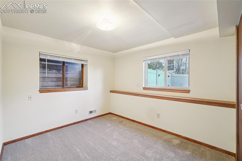 Downstairs there are two other rooms that could be used for a variety of needs.