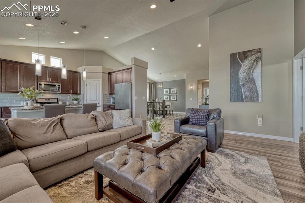 View of the Living Room, Kitchen, and Dining Room.