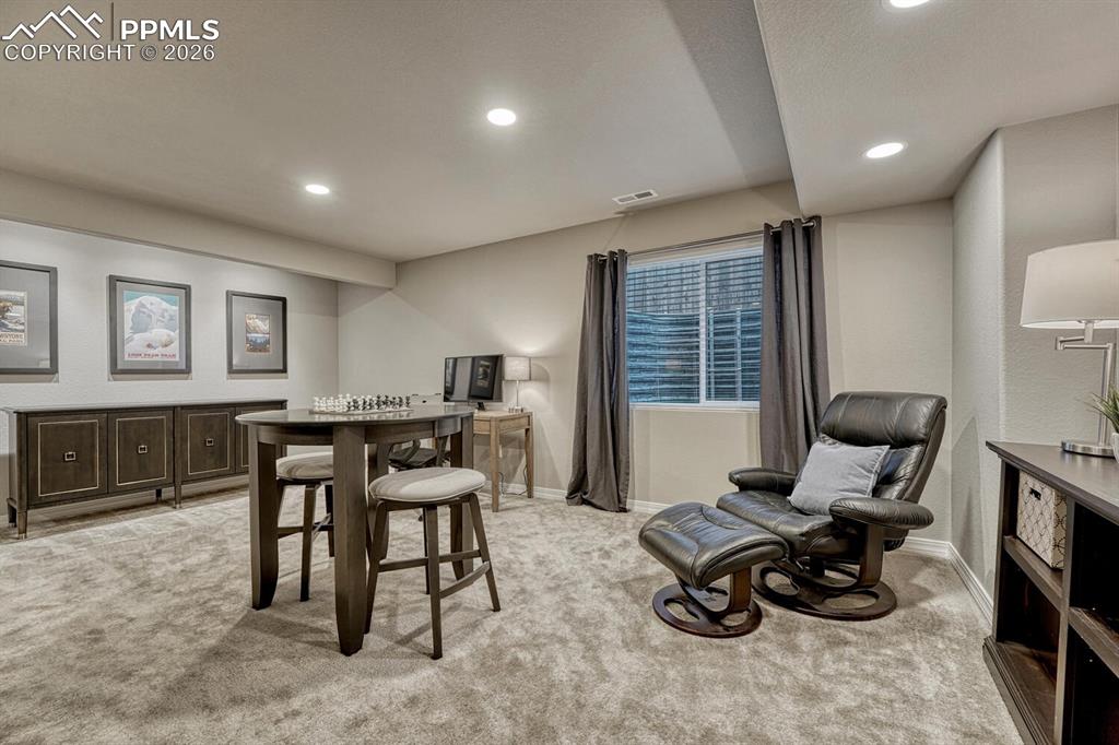Basement Family Rec Room with game and sitting area.