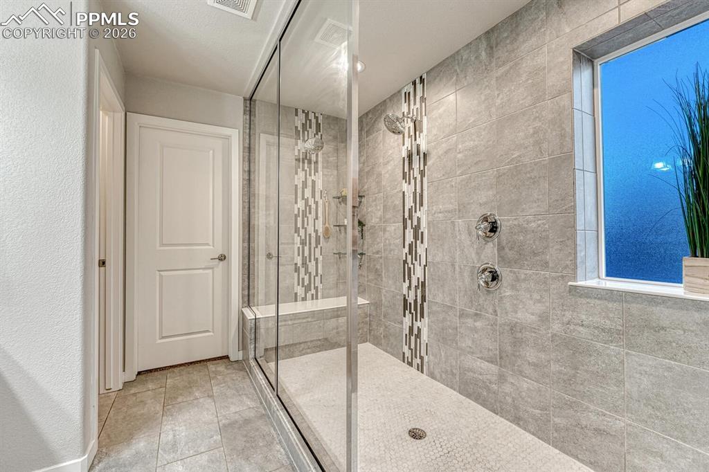 Bathroom featuring a walk in shower