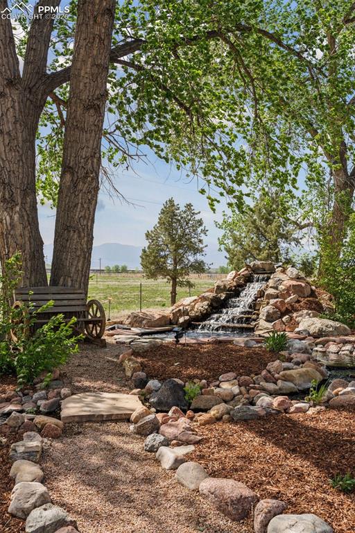 Waterfall Feature w/babbling brook in Front of Residence