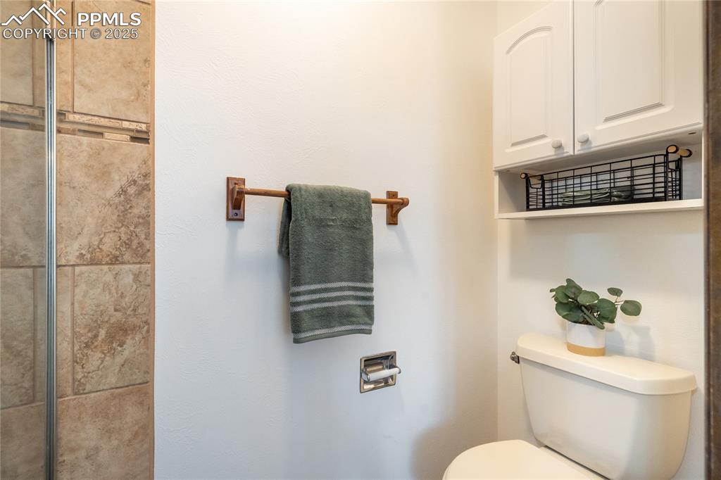 Private shower & commode space to primary bedroom