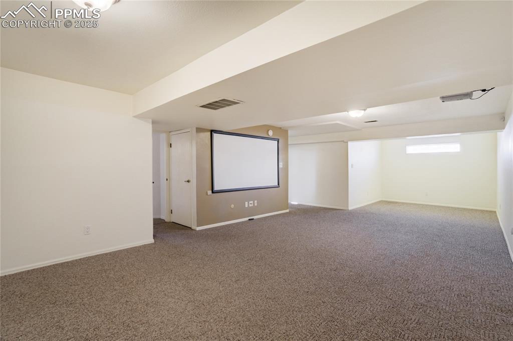 Basement Family Room includes Projector and Screen