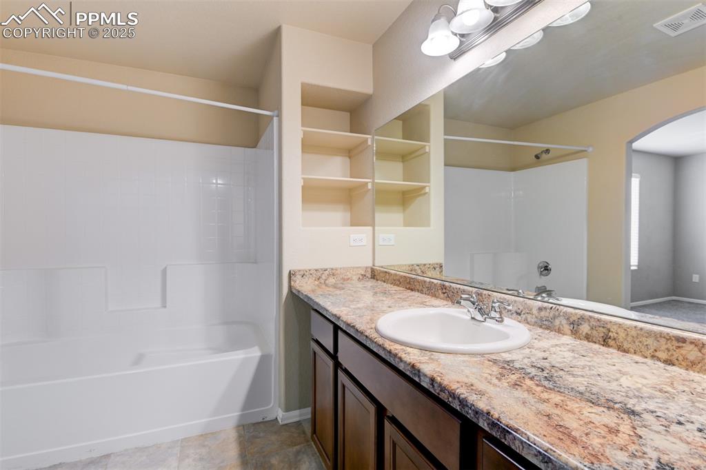 Bathroom with  shower combination and vanity