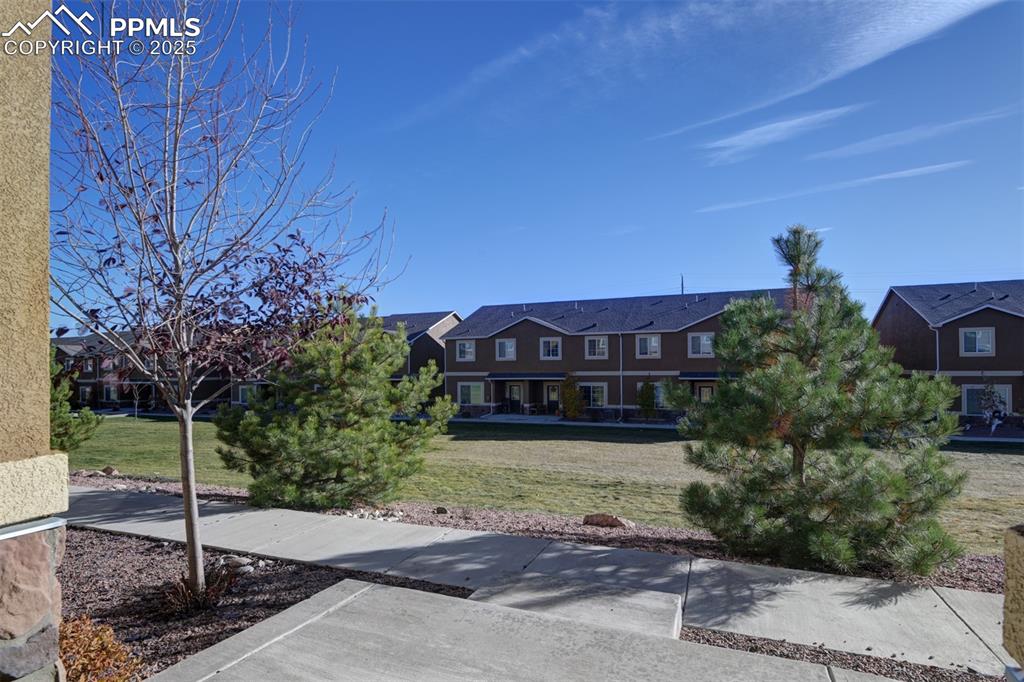 View of front of house with a front lawn