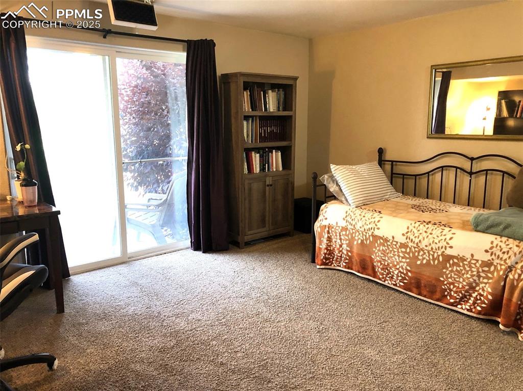 Downstairs suite with full bath and walk out to patio.