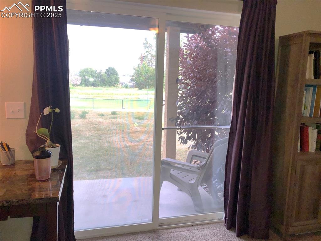 Covered back porch, grassy area