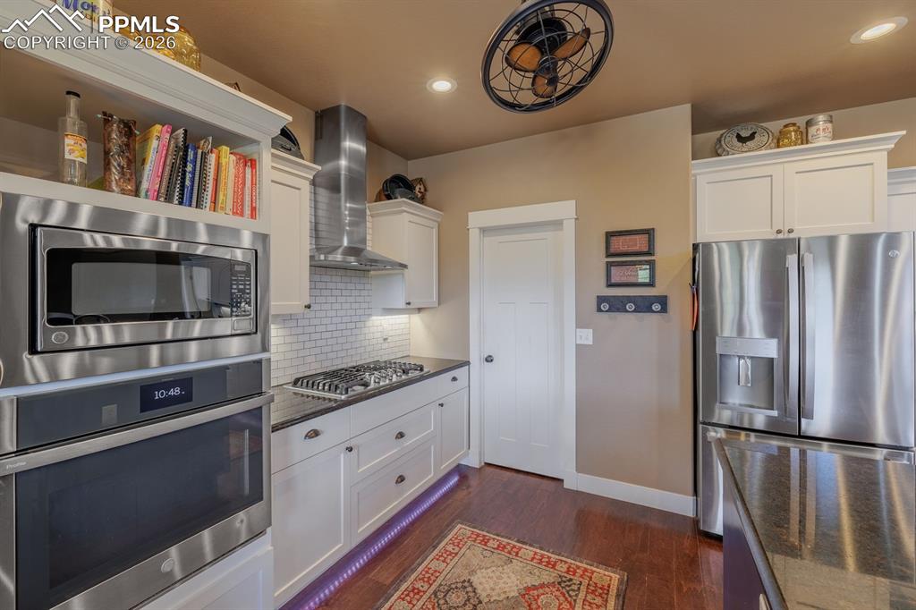 This kitchen is designed to be efficient and comfortable.