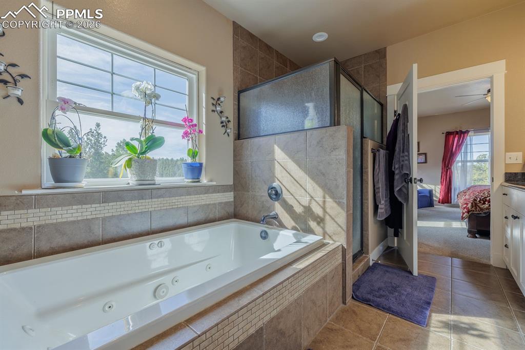 Jetted and heated tub.