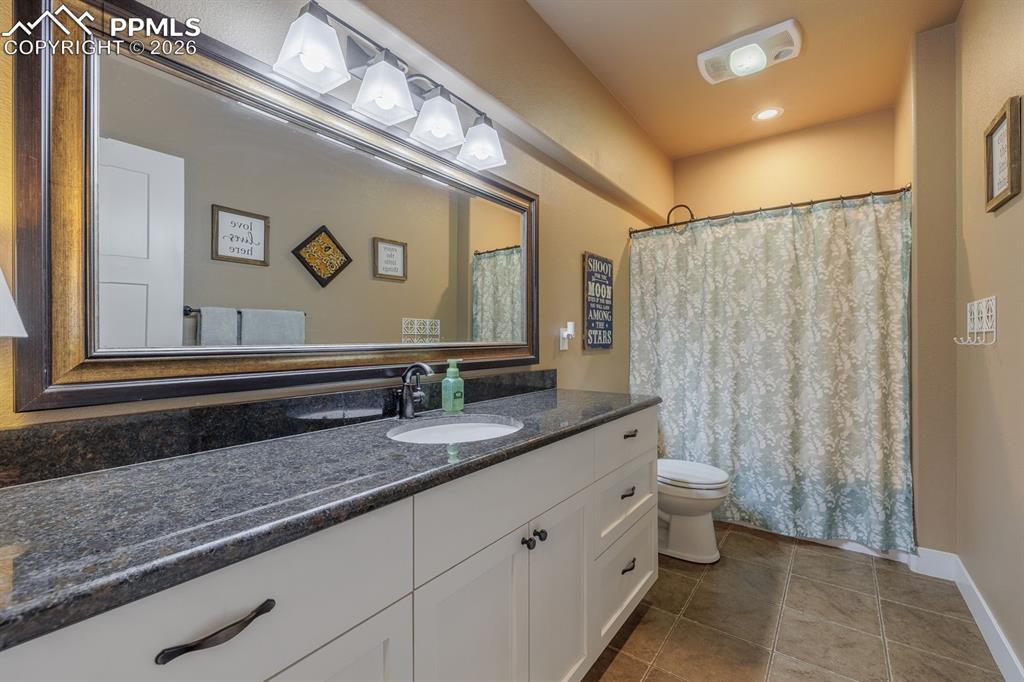 bathroom serving the two lower level bedrooms