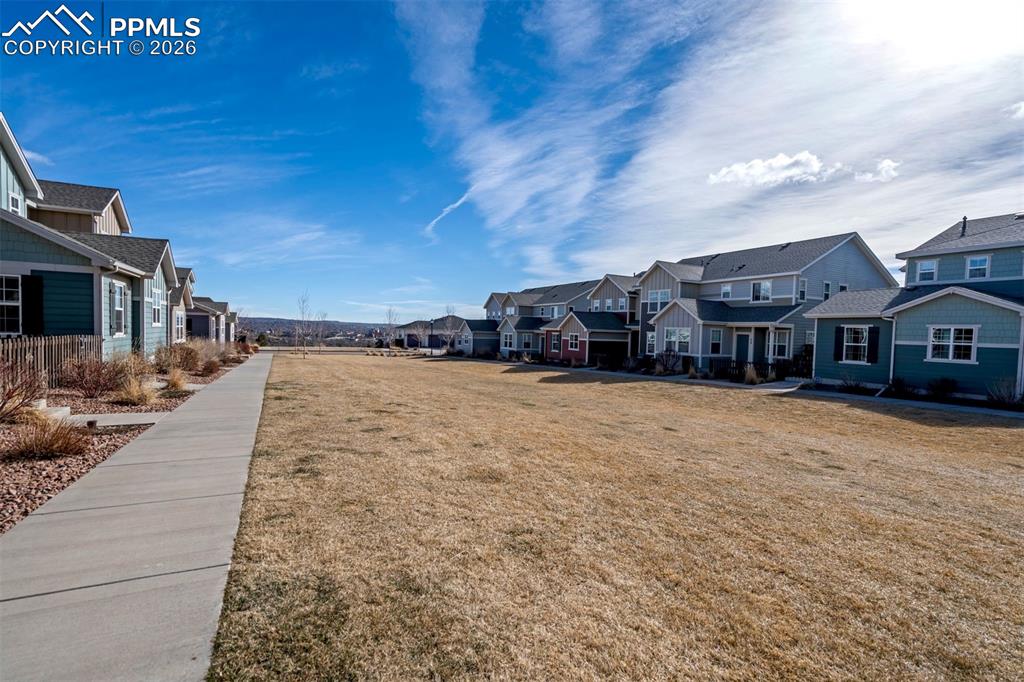 View of the greenbelt area outside the townhome.  