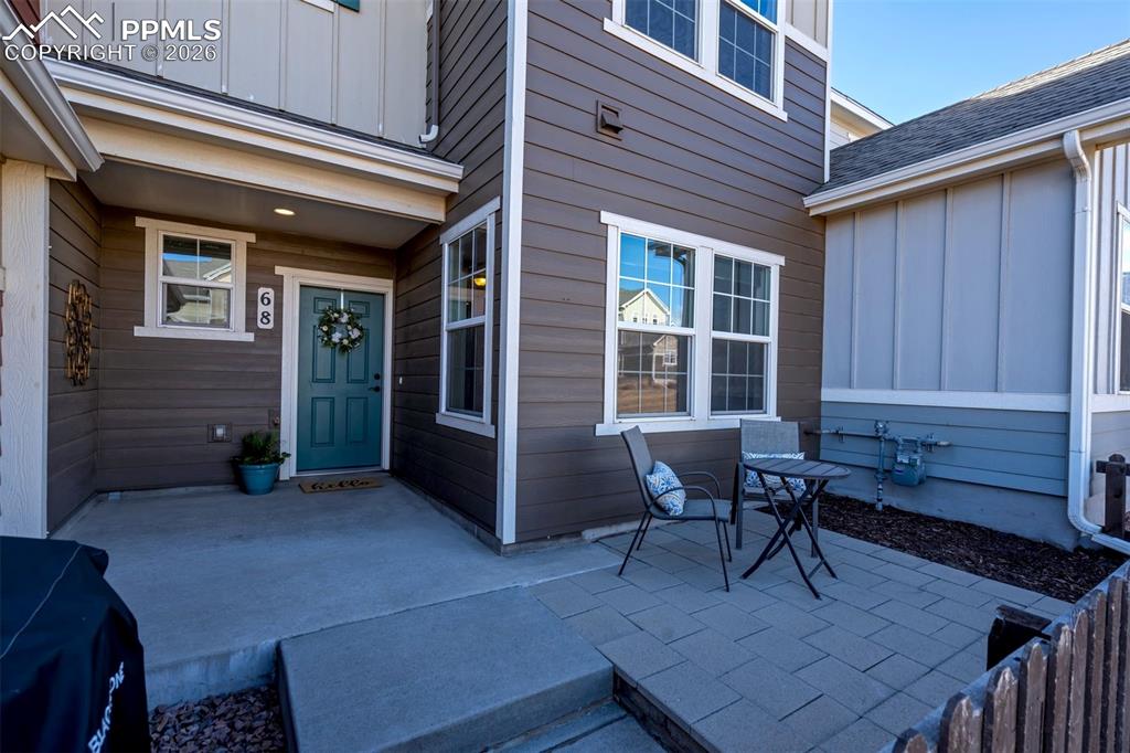 This shows the patio and front door of the townhome.