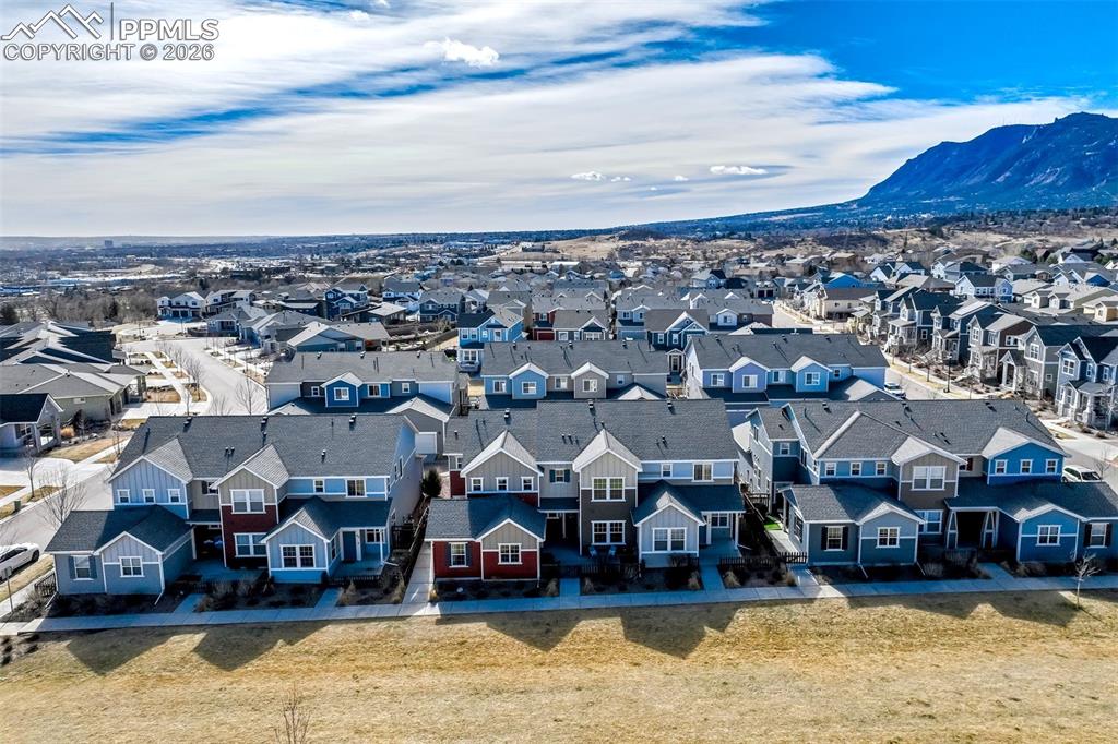 Aerial perspective of the townhome(in the centre cluster) looking to the east and then to the west for the mountain view.