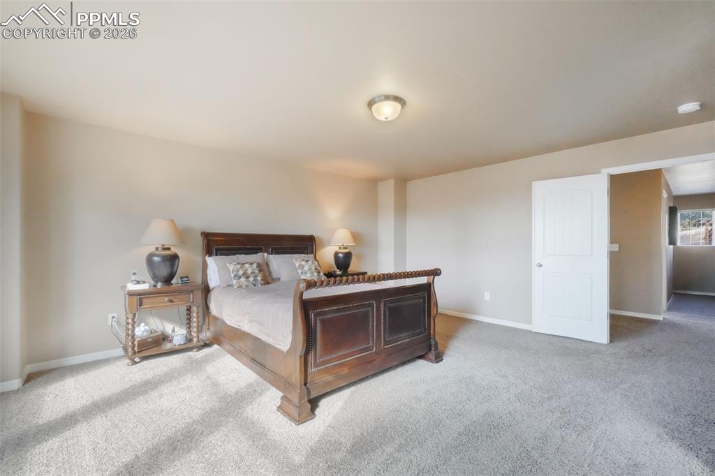 Upstairs primary bedroom with mountain views, 5 piece ensuite bathroom and large walk in closet