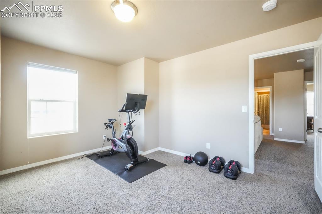 Upstairs fourth bedroom with walk in closet, views of the mountains