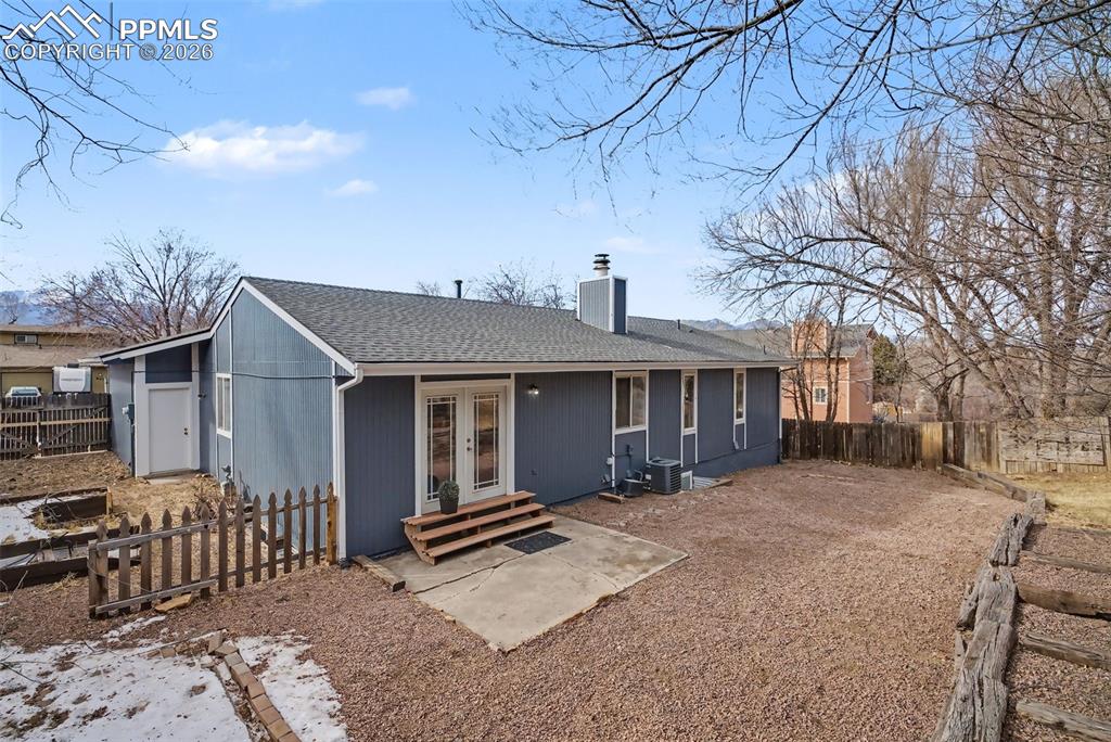 Side yard to garage, raised planters 