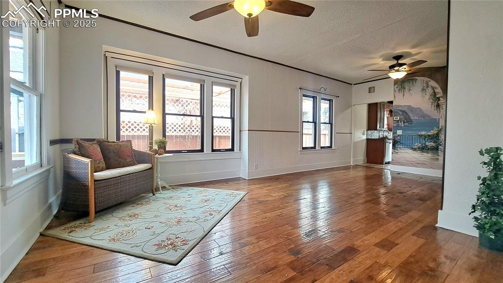 Living/dining room in the main home. Hickory wood floors and Pella windows!