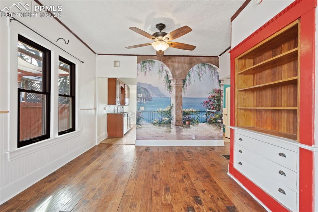 Living/dining room in the main home. Hickory wood floors and Pella windows!