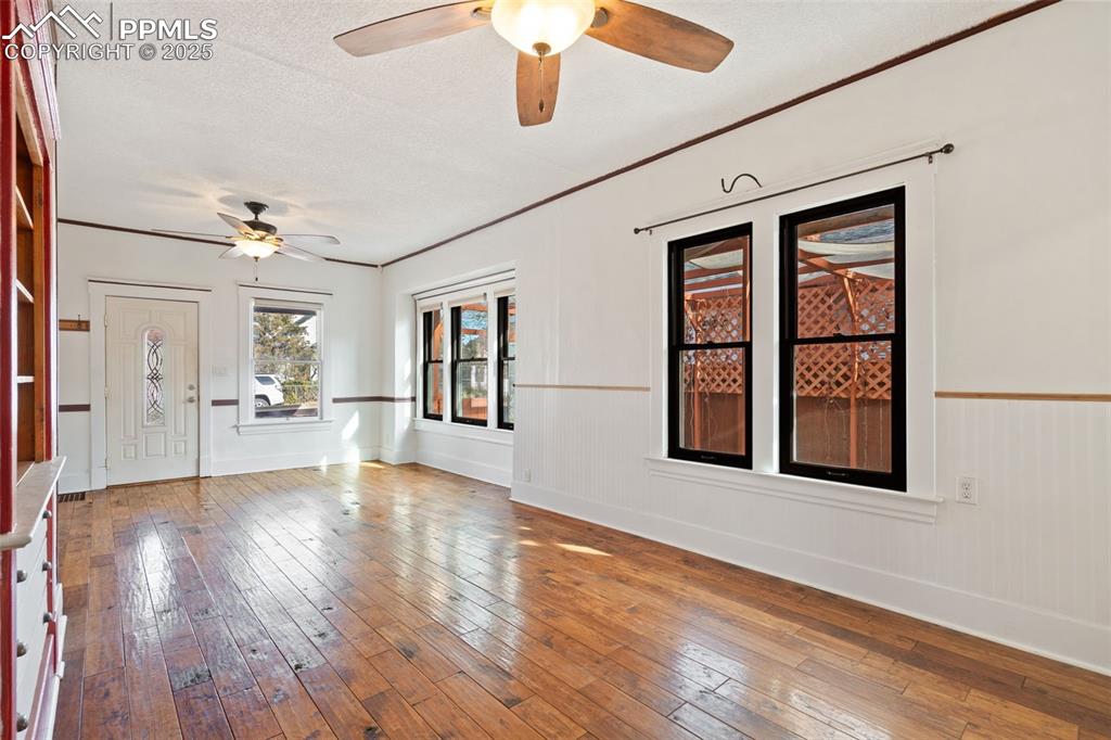 Living/dining room in the main home. Hickory wood floors and Pella windows!