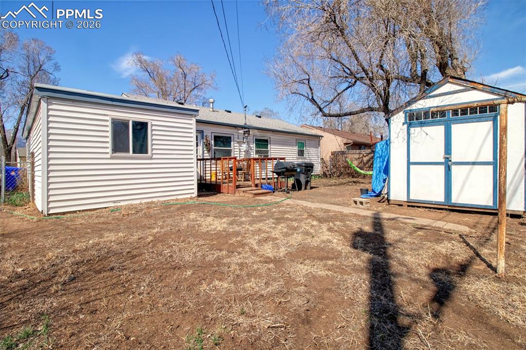 Back of home with shed