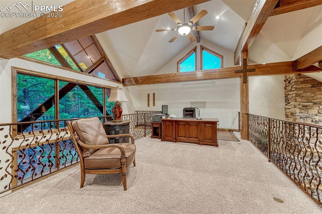 The upper level loft provides an inspiring setting for a home office.