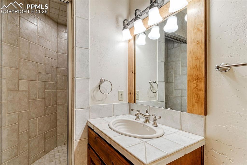 Relaxing steam shower offering a spa-like experience in the lower level.