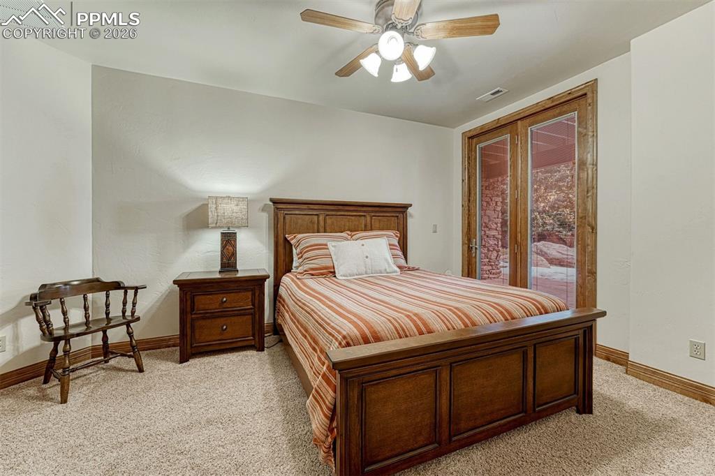 Lower level bedroom with private walk-out to the outdoors.