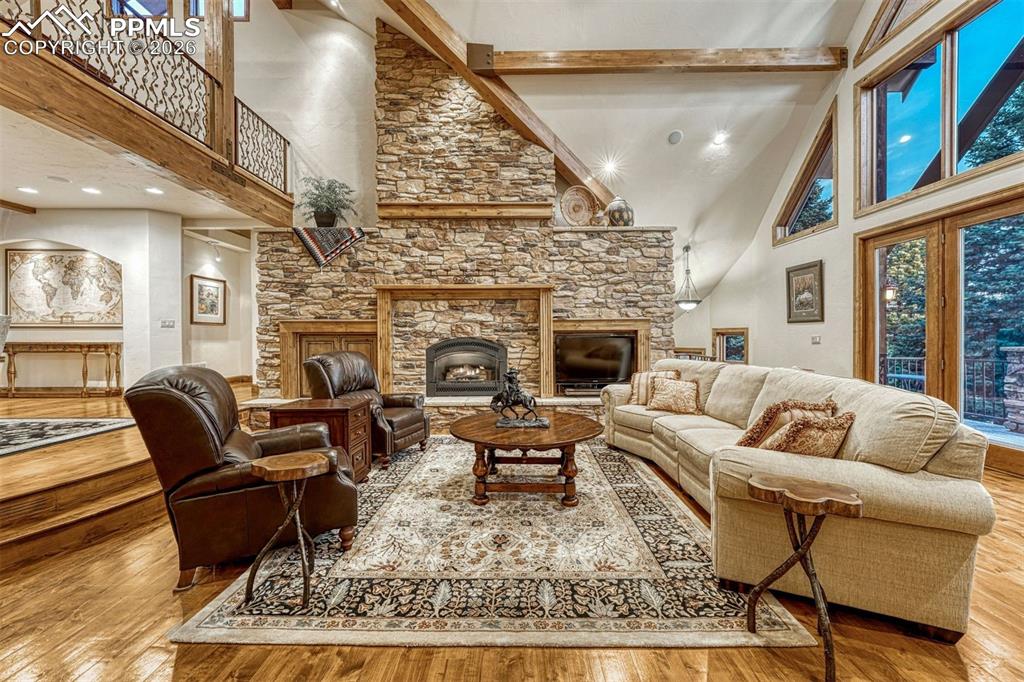 Quintessential Colorado great room with soaring ceilings and warm timber accents.