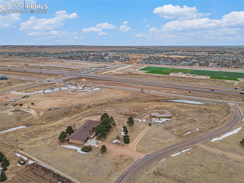 Aerial view of property's location featuring rural landscape