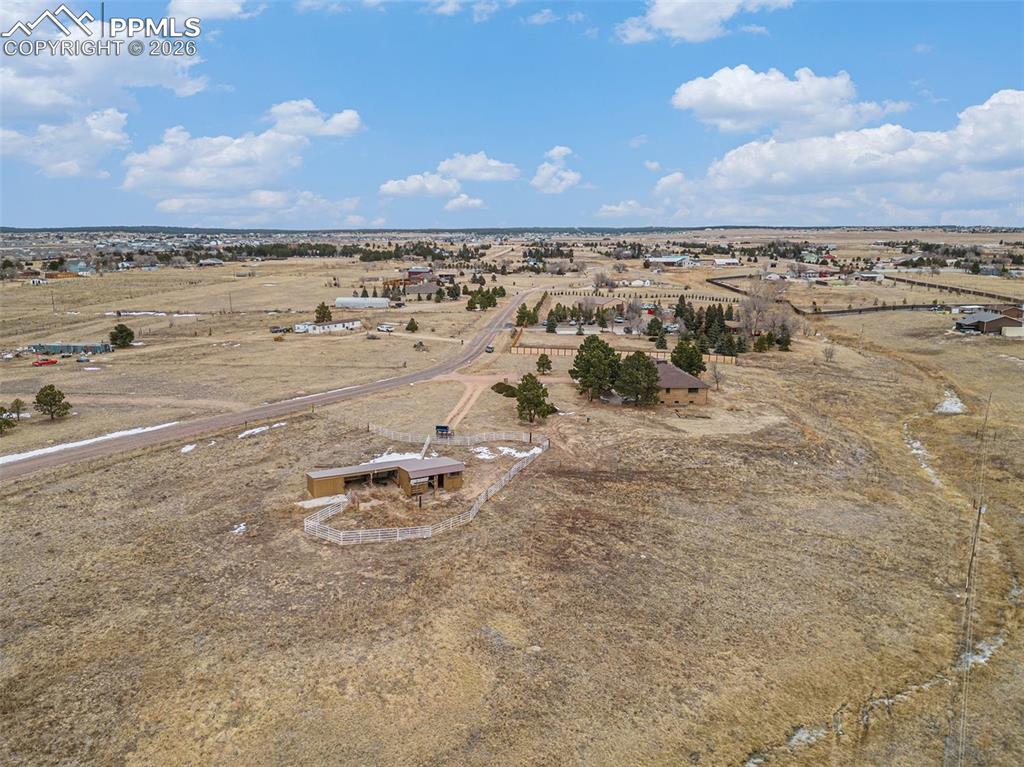 Aerial overview of property's location with rural landscape