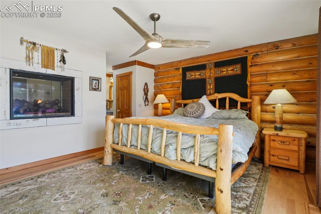 Wood floors, ceiling van and 2 sided fireplace