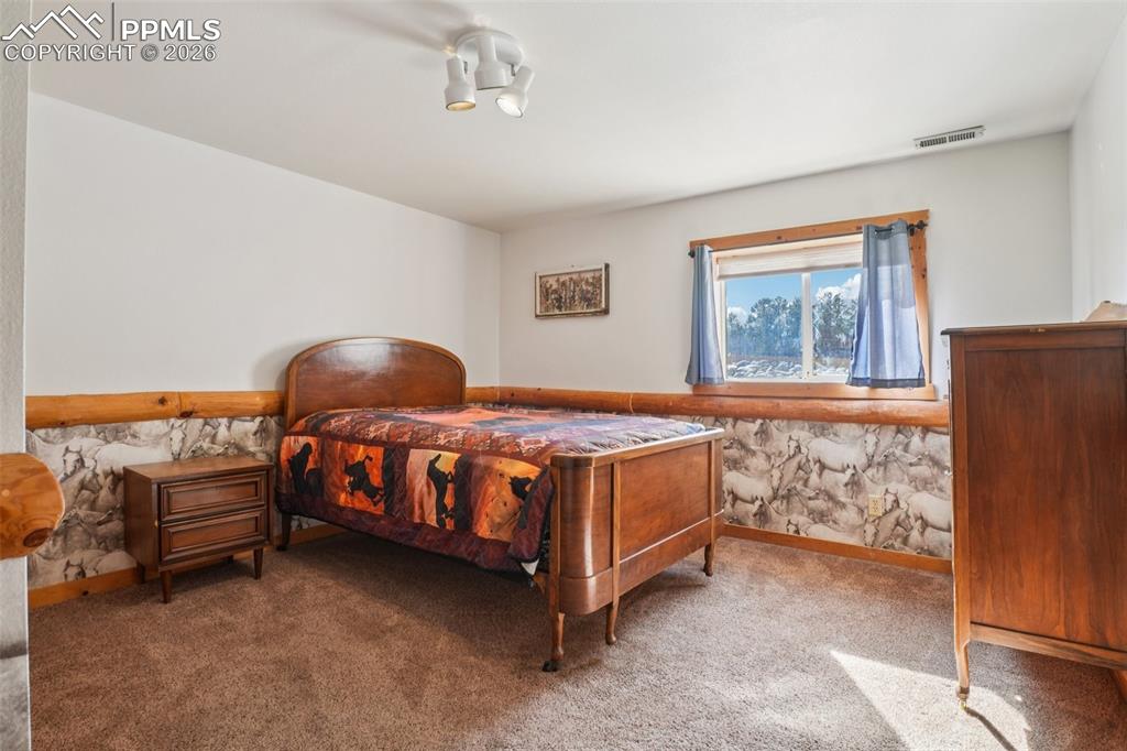 Carpeted basement bedroom 