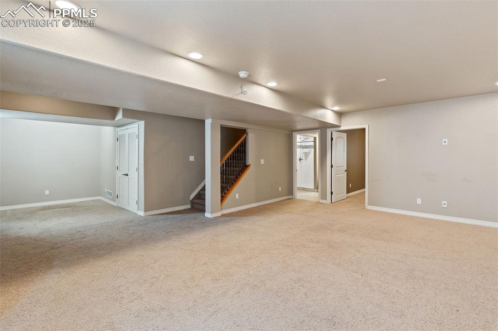 View 2 of the oversized basement family room. Imagine all of the ways you can use this awesome space!