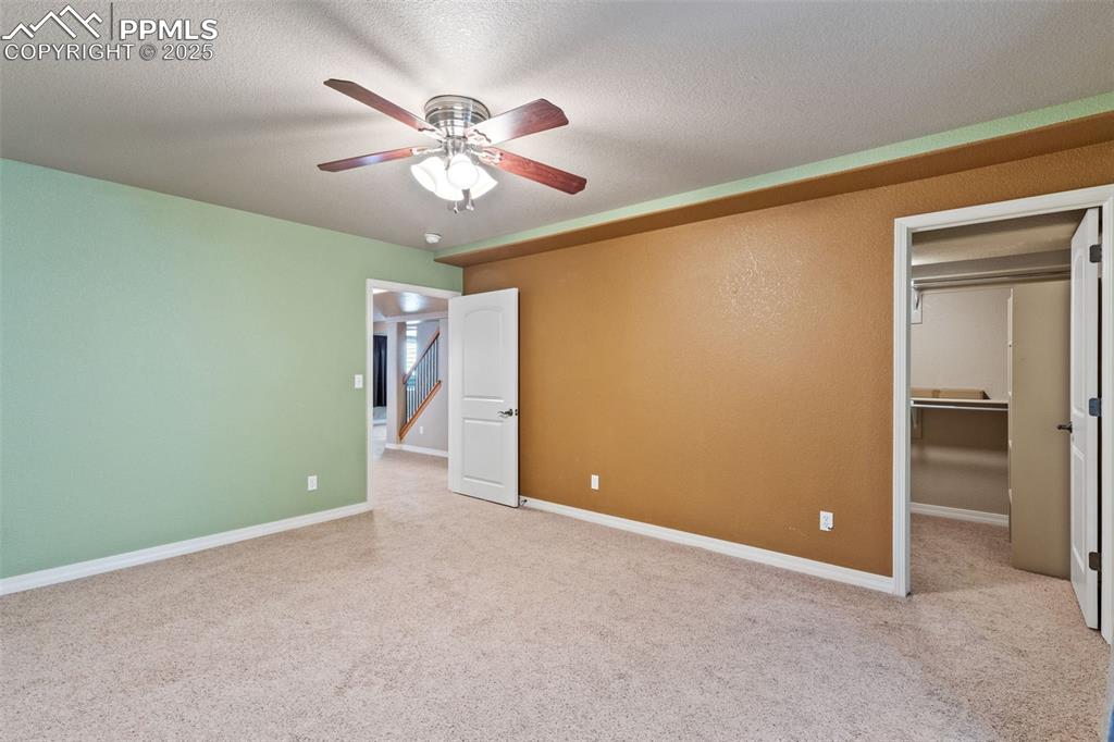Basement bedroom 4 includes an oversized walk-in closet.