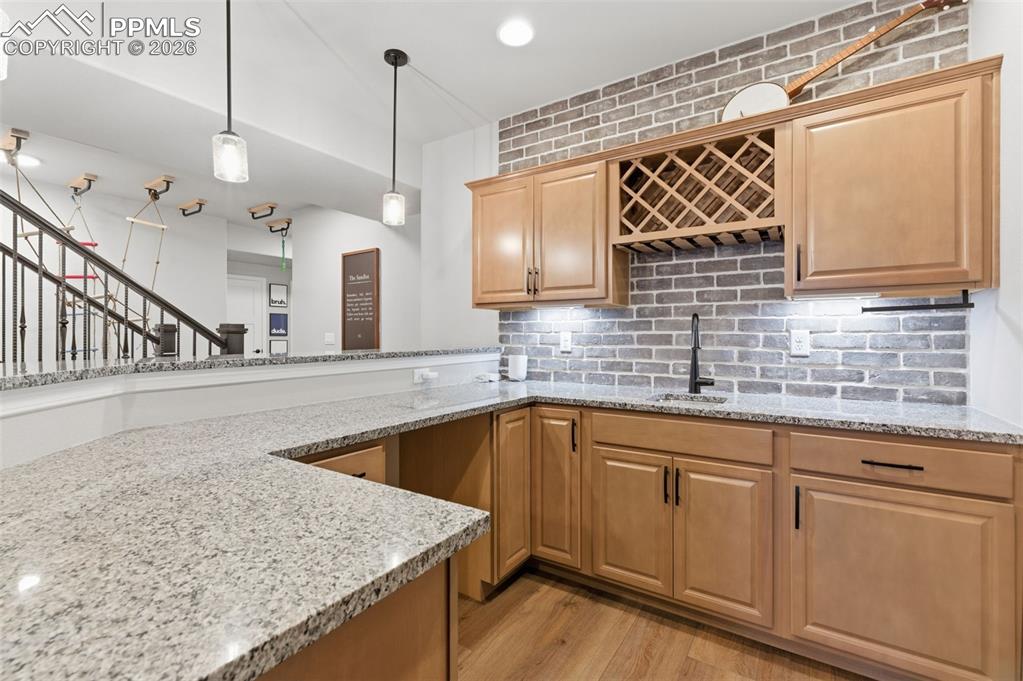 Notice All The Cabinets And Brick Backsplash In The Wet Bar!