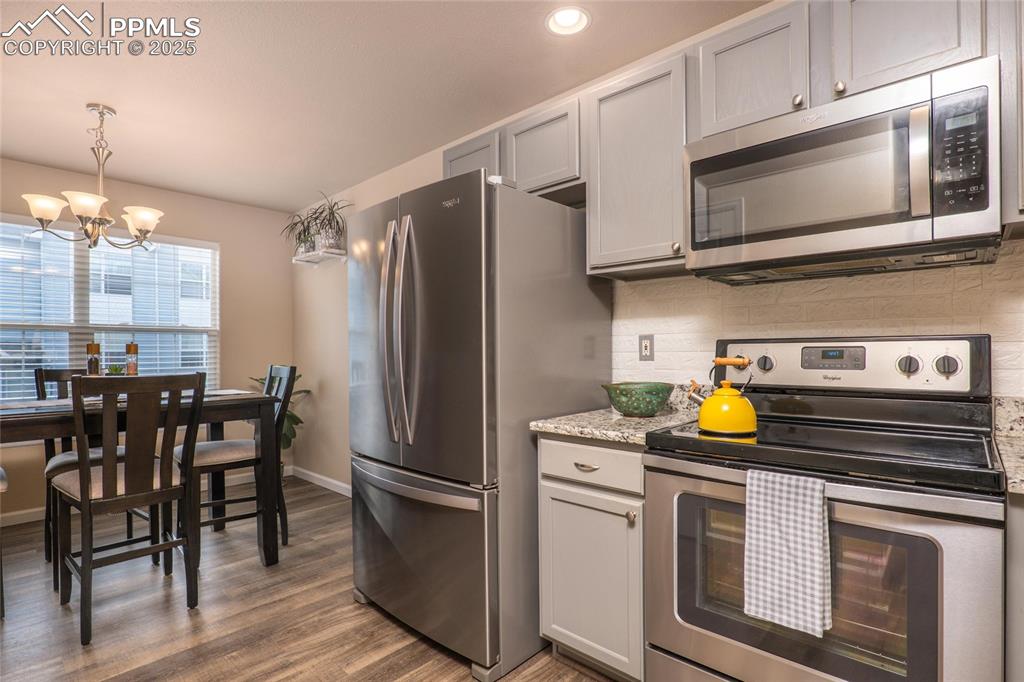 Kitchen opens to the dining area.