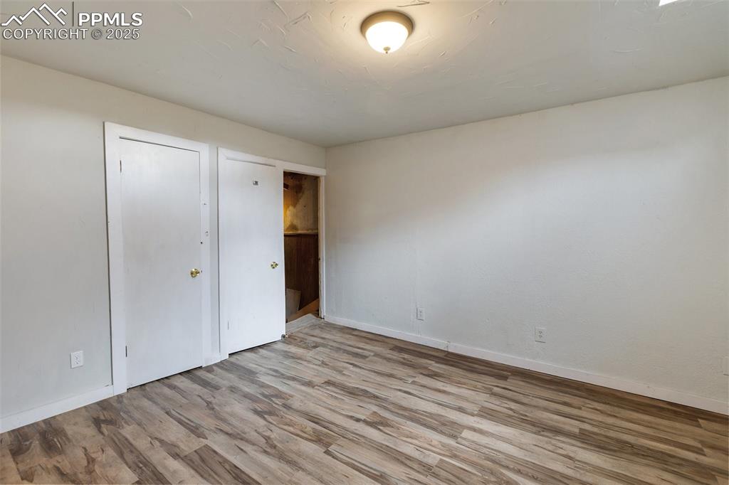 Bedroom with new laminate flooring