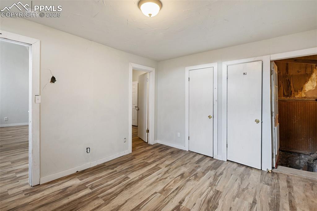 Bedroom with new laminate flooring