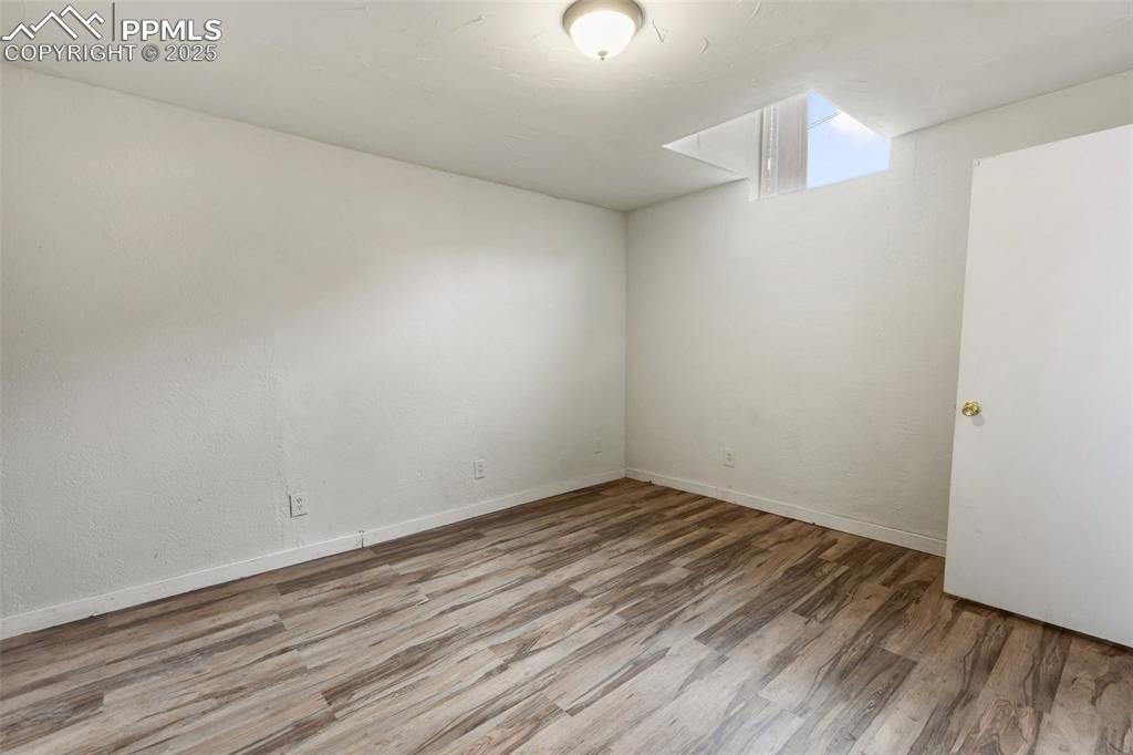 Bedroom with new laminate flooring