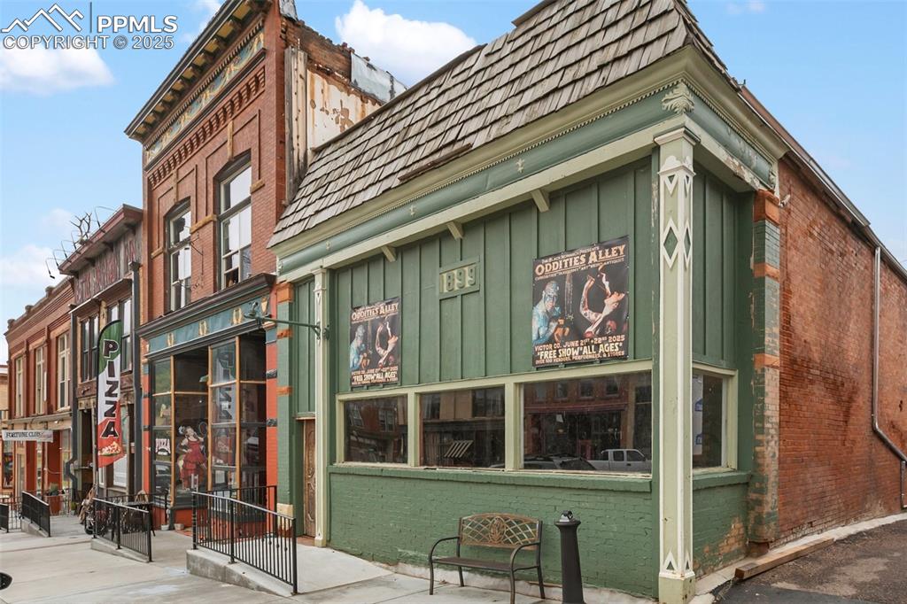 1899 storefront on Victor Avenue with tall display windows and classic historic façade